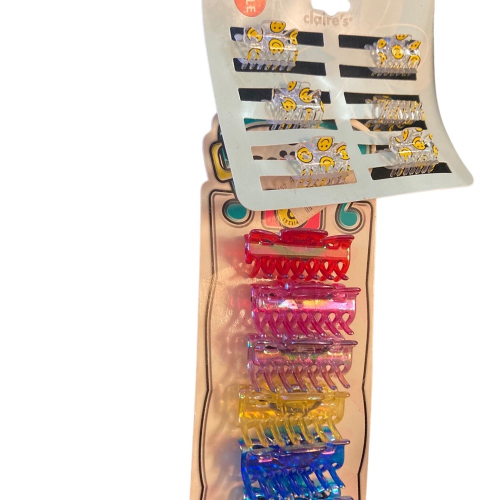 Scunci Vintage Hair Clips ones that is colorful and one set has smiley faces NWT